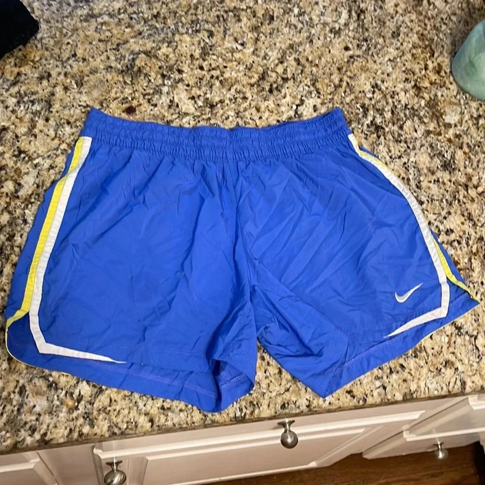 Nike blue and yellow shorts size L